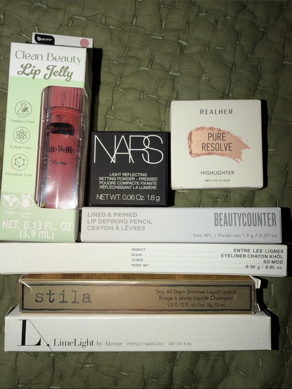 Assorted Makeup items NIB , including Highlighter , Lipgloss, 7 items